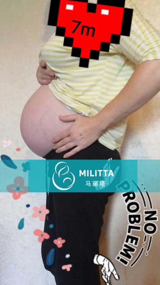 Z女士的怀孕7个月了,拍个照纪念一下